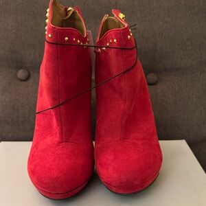 Chic Red Ankle Boots with Gold Accents